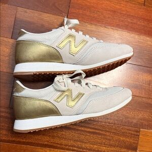 New Balance Women's Gold and Cream Sneakers- never worn